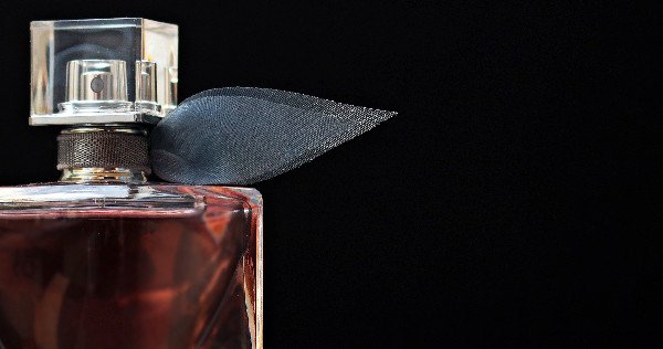 Perfume bottle on a black background